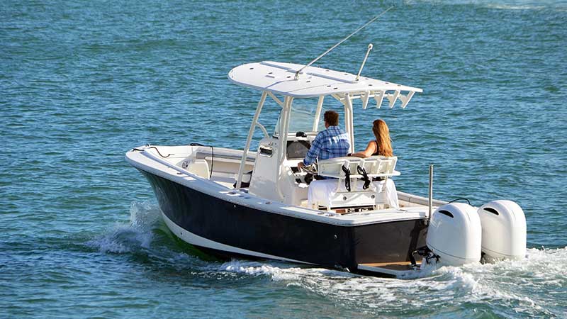 a couple travels via boat on open water