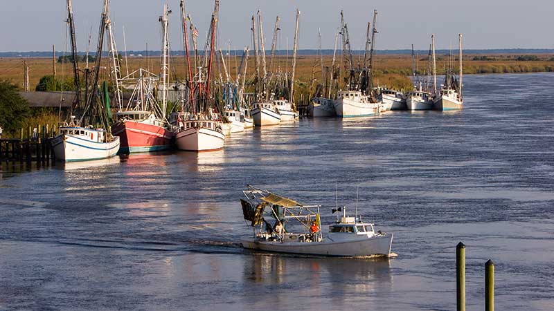 working boats and older boats occupy a waterway