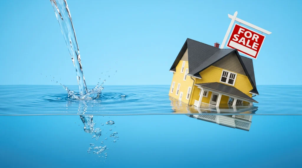 Home flood damage concept showing the financial impact of water damage and the importance of protecting a home with flood insurance.